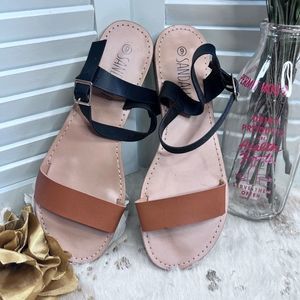 SANDALUP Women’s Soft Faux Leather Open Toe and Ankle Strap Buckle Flat Sandals